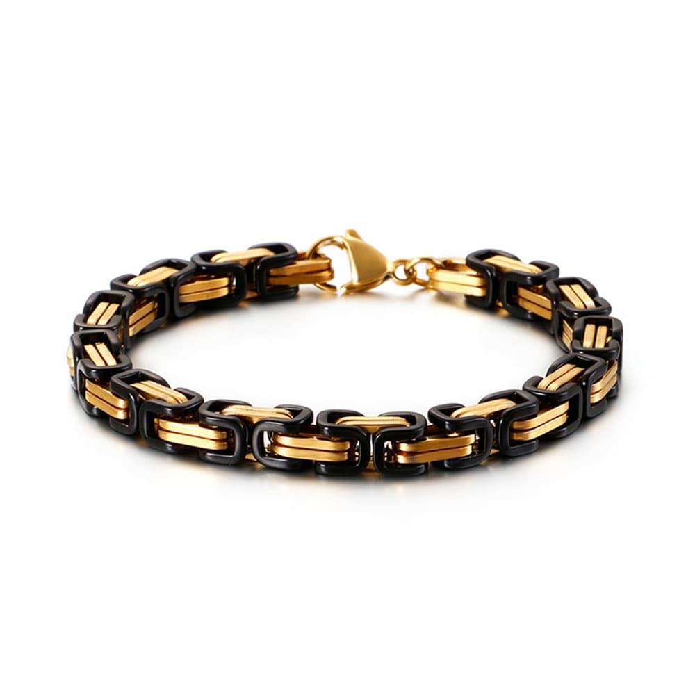 Prestige two-tone byzantine woven chain bracelet featuring alternating links of deep black and brilliant yellow gold.