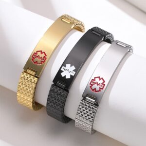 Three stainless steel elastic medical ID bracelets displayed in IP gold, black, and silver finishes with colored emergency alert symbols.