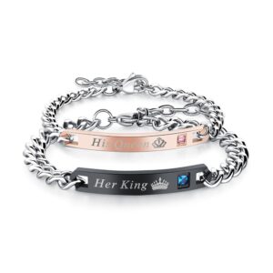 Pair of stainless steel couple bracelets featuring a black bar engraved with Her King and a blue crystal, and a rose gold bar engraved with His Queen and a pink crystal.