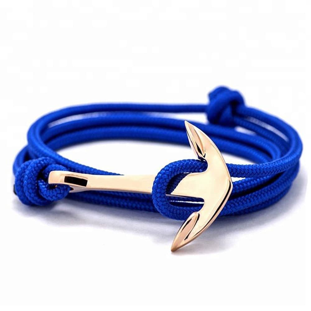 Electric blue adjustable braided nylon wrap bracelet paired with a warm rose gold-plated stainless steel anchor clasp.