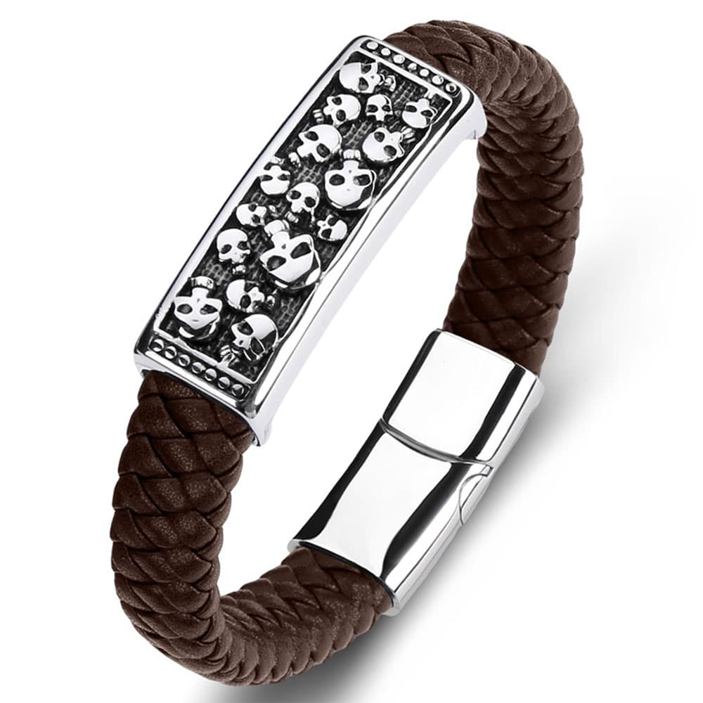 Rugged dark brown woven leather bracelet for men featuring an antique silver-tone stainless steel skull plate.