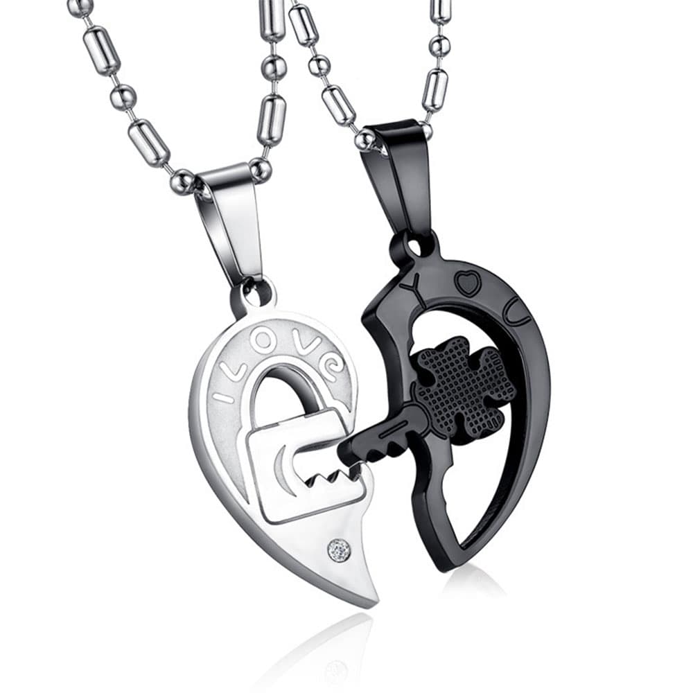 Stainless steel lock and key matching heart puzzle couple necklace set in black and silver with engraved I Love You text and cubic zirconia detail.
