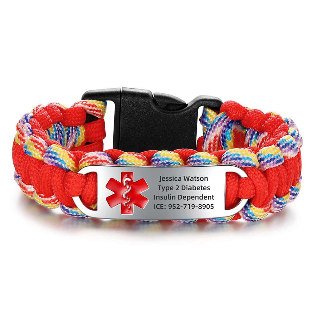 Personalized medical alert ID paracord bracelet featuring red and rainbow braided cord and custom engraved steel plate.