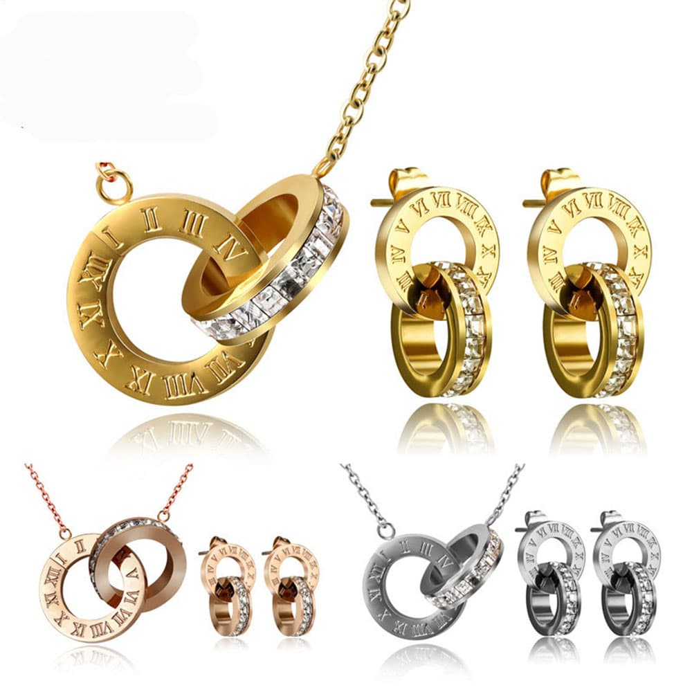 18K gold plated stainless steel Roman numerals interlocking circles necklace and earrings set shown alongside rose gold and silver variants.